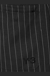 Black y-3 men’s pinstriped fabric bermuda shorts featuring subtle logo embroidery on the front pocket