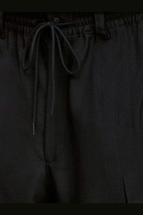 Y-3 men’s recycled polyester black bermuda shorts with elastic waistband and subtle textured fabric
