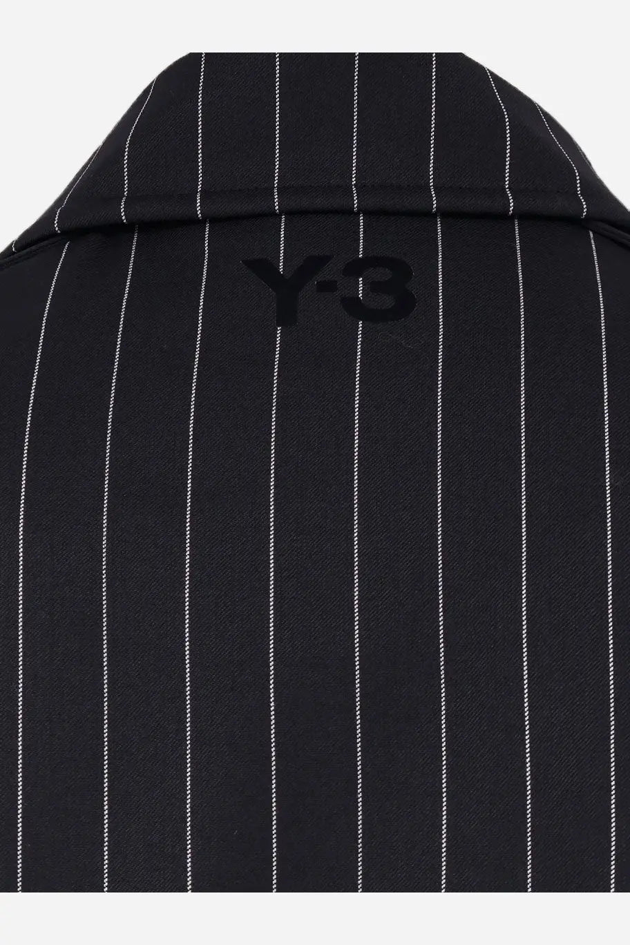 Back view of y-3 men’s recycled polyester black pinstripe blazer with white stripes and y-3 logo on collar