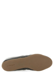 Y-3 men’s sneakers tokyo black black leather adidas sneaker with tan rubber sole and three stripes on the side