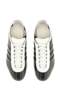 Black and white leather adidas y-3 men’s sneakers tokyo black with three iconic stripes on the side