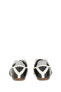 Y-3 men’s sneakers Tokyo Black black and white leather lace-up flats with sleek minimalist design