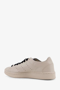 Beige leather low-top y-3 men’s stan smith sneaker with black laces and perforated detailing