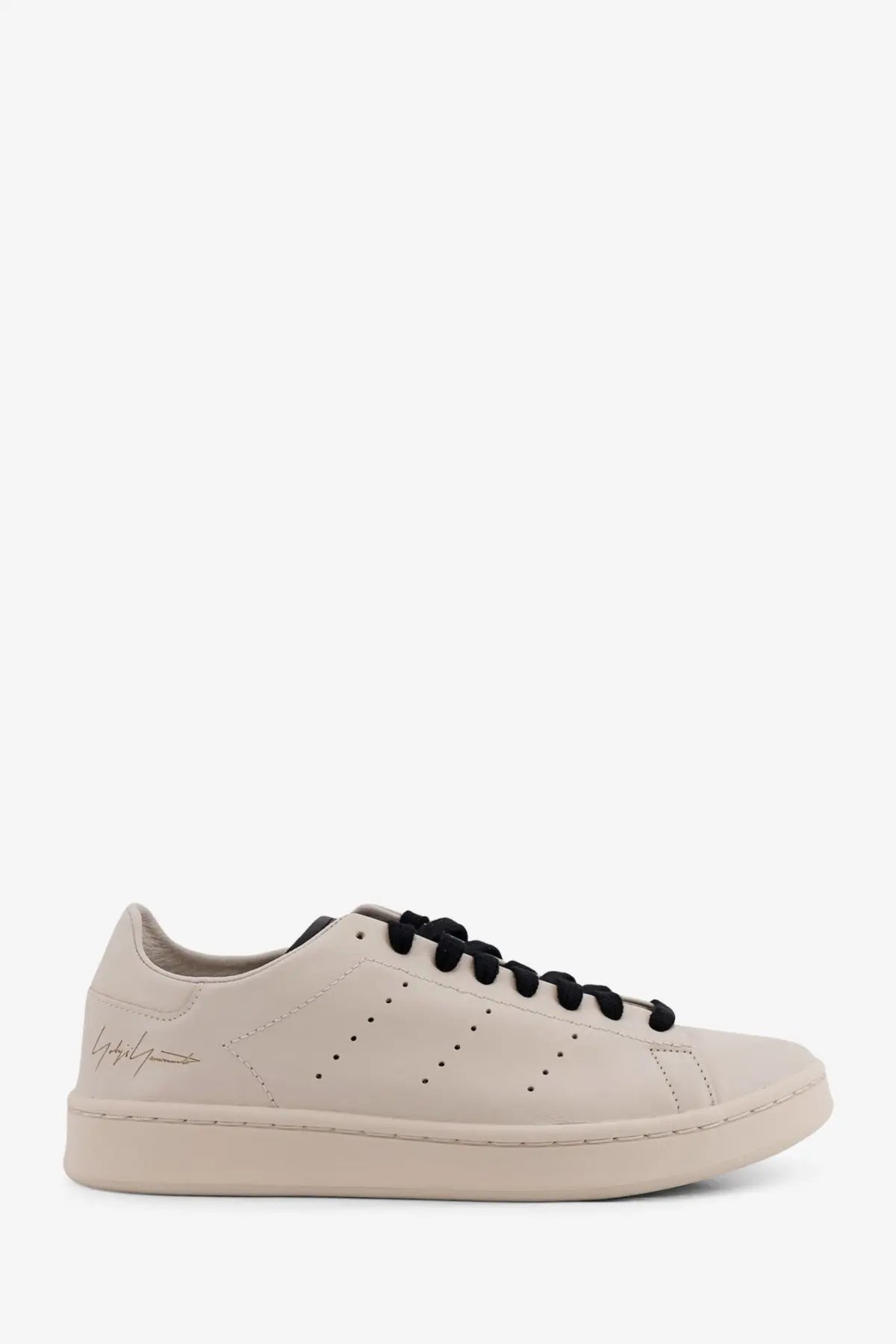 Beige leather low-top y-3 men’s stan smith sneaker with black laces and signature logo on the side
