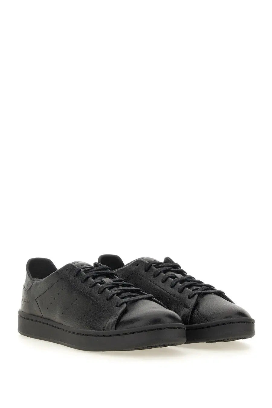 Y-3 men’s stan smith sneaker black low-top leather with sleek minimalist design and subtle toe box perforations