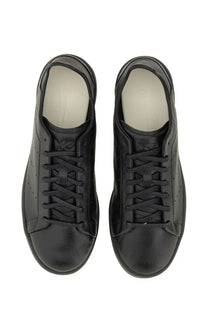 Y-3 men’s stan smith sneaker black in black leather with sleek minimalist design and subtle perforations along the sides