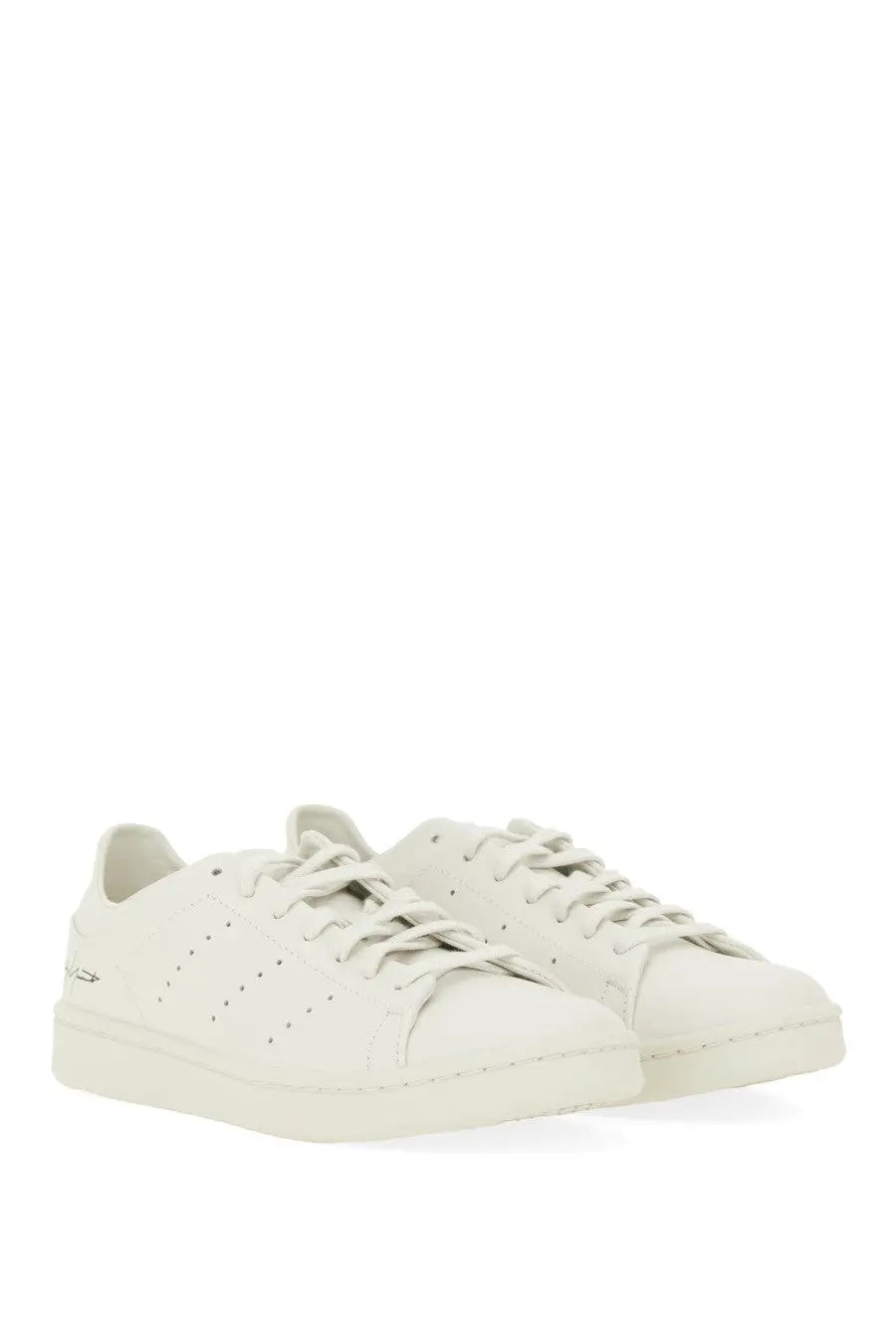 Y-3 men’s stan smith sneaker grey featuring white leather with perforated detailing and minimalist design