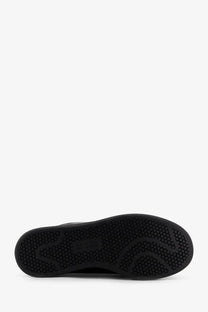 Black rubber sole with hexagonal tread pattern on y-3 men’s stan smith velcro grey leather sneakers