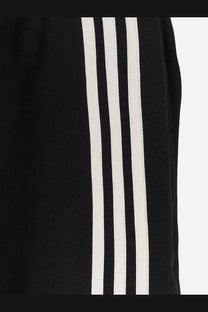 Black adidas y-3 men’s su bball recycled polyester track pants with three bold white stripes down the side