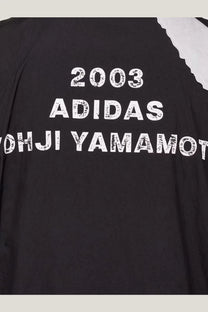 Black adidas x yohji yamamoto y3 men’s water repellent nylon jacket with white distressed lettering and white shoulder panel