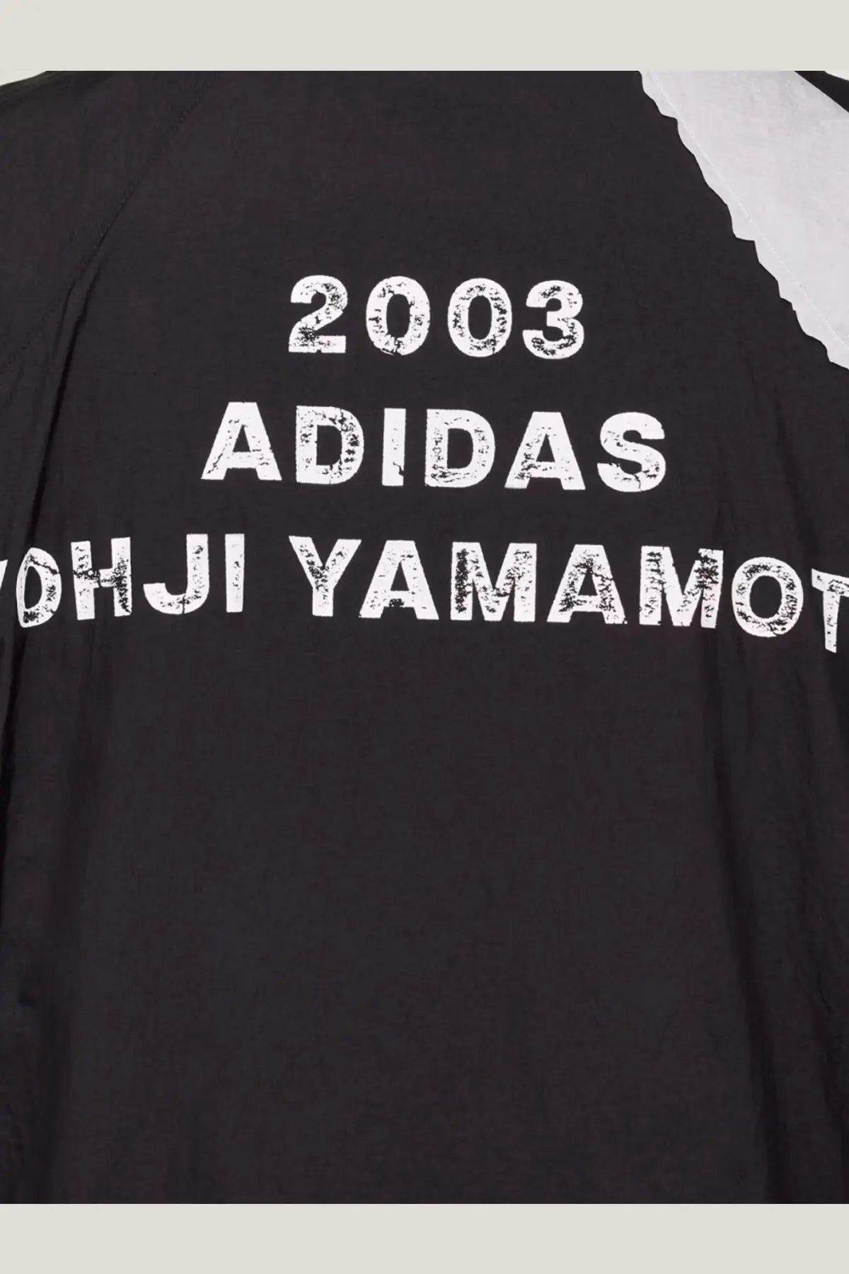 Black adidas x yohji yamamoto y-3 men’s water repellent nylon jacket with white distressed lettering and shoulder panel