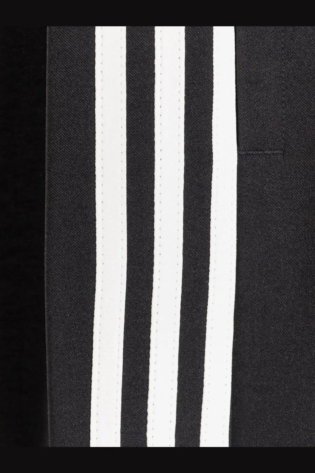 Y-3 men’s wire pants black recycled polyester trousers with three bold white stripes running vertically on the side