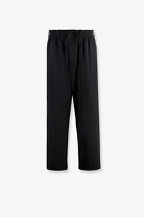 Black sleek wide-leg y-3 men’s wire pants with elastic waistband and drawstring made from recycled polyester
