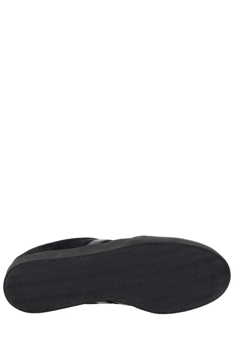 Black rubber sole with wavy tread pattern of y-3 unisex gazelle sneaker in black viewed from the back side