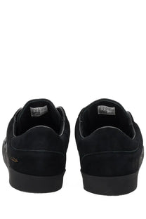 Black suede y-3 unisex gazelle low-top sneakers with matte finish and subtle gold logo on the heel back side