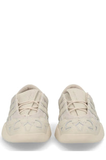 Cream-colored Y-3 unisex regu sneaker with textured perforated upper and chunky rubber sole in grey tones