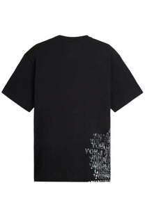 Black oversized Y-3 unisex t-shirt featuring bold white repeating yohji text graphic on lower right side