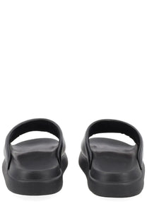 Black rubber slide sandals y-3 unisex slide con with thick cushioned sole and simple strap design