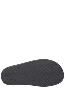 Black rubber sole with herringbone tread pattern of y-3 unisex slide con black sandal visible from the back side