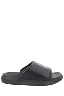 Black y-3 unisex slide con slip-on sandal with minimalist design and subtle white logo on strap