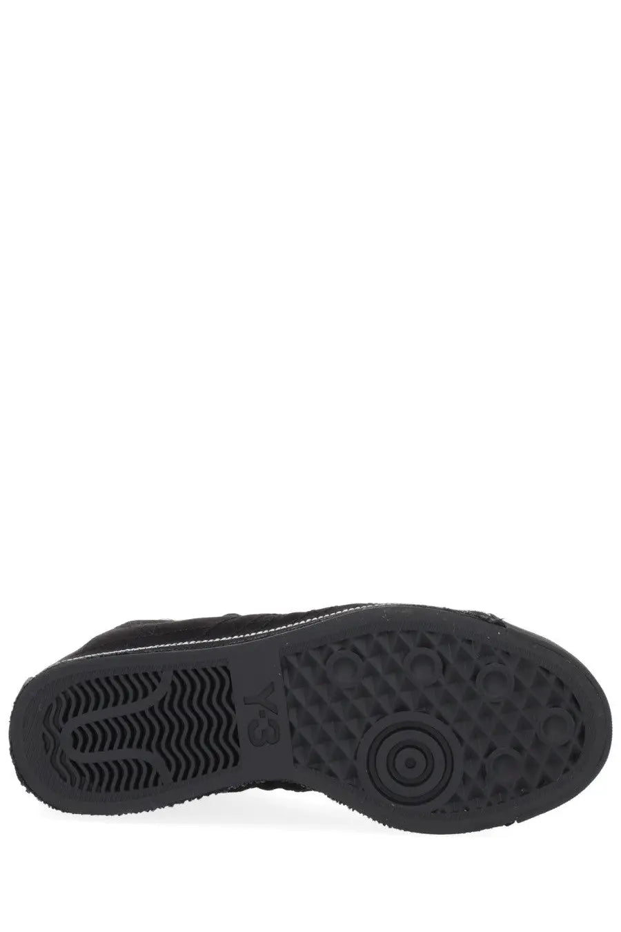 Black rubber sole with textured pattern and y-3 logo embossed on the y-3 unisex sneaker nizza neighborhood black