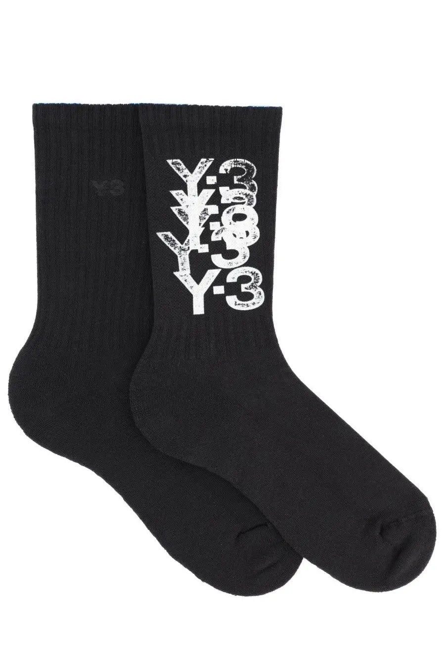Black y-3 unisex crew socks featuring bold stacked white logo design in a comfortable cotton blend material