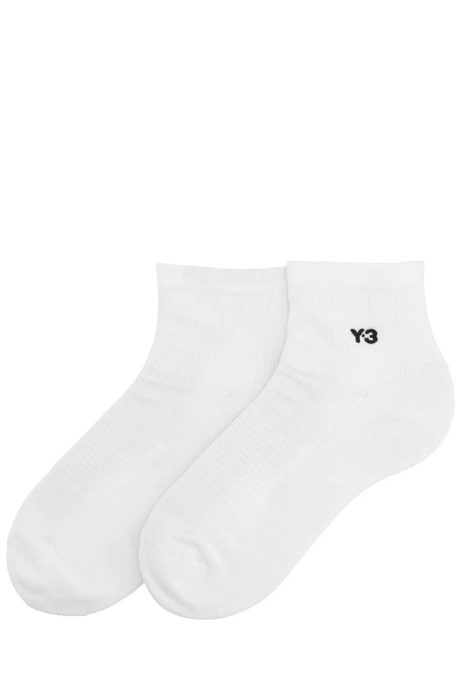 White y-3 unisex ankle socks with minimalist design and subtle black logo on cuff made from soft cotton blend