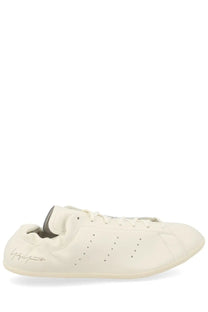 Cream-colored leather Y-3 unisex Stan Smith LO Pro sneaker with subtle perforations and signature logo on the side