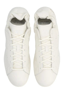 White leather y-3 unisex stan smith lo pro sneaker with classic lace-up design and subtle perforations
