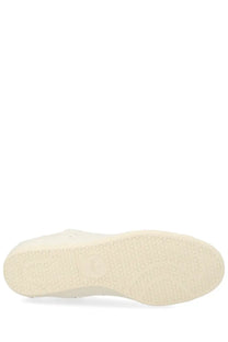 White rubber sole with textured hexagonal pattern on y-3 unisex stan smith lo pro sneaker white