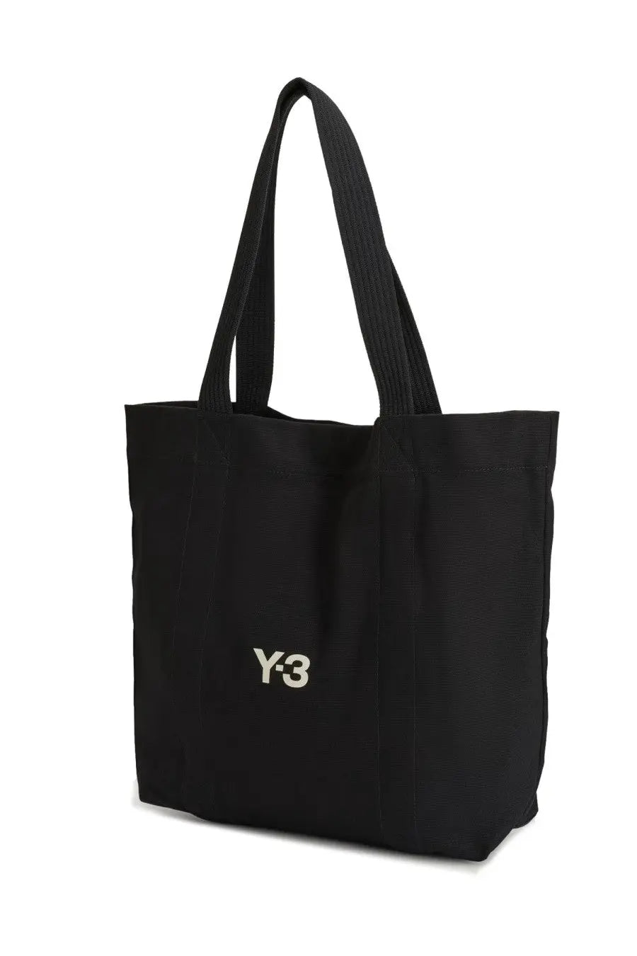 Black canvas y-3 unisex tote bag featuring white embroidered logo on the front for everyday use