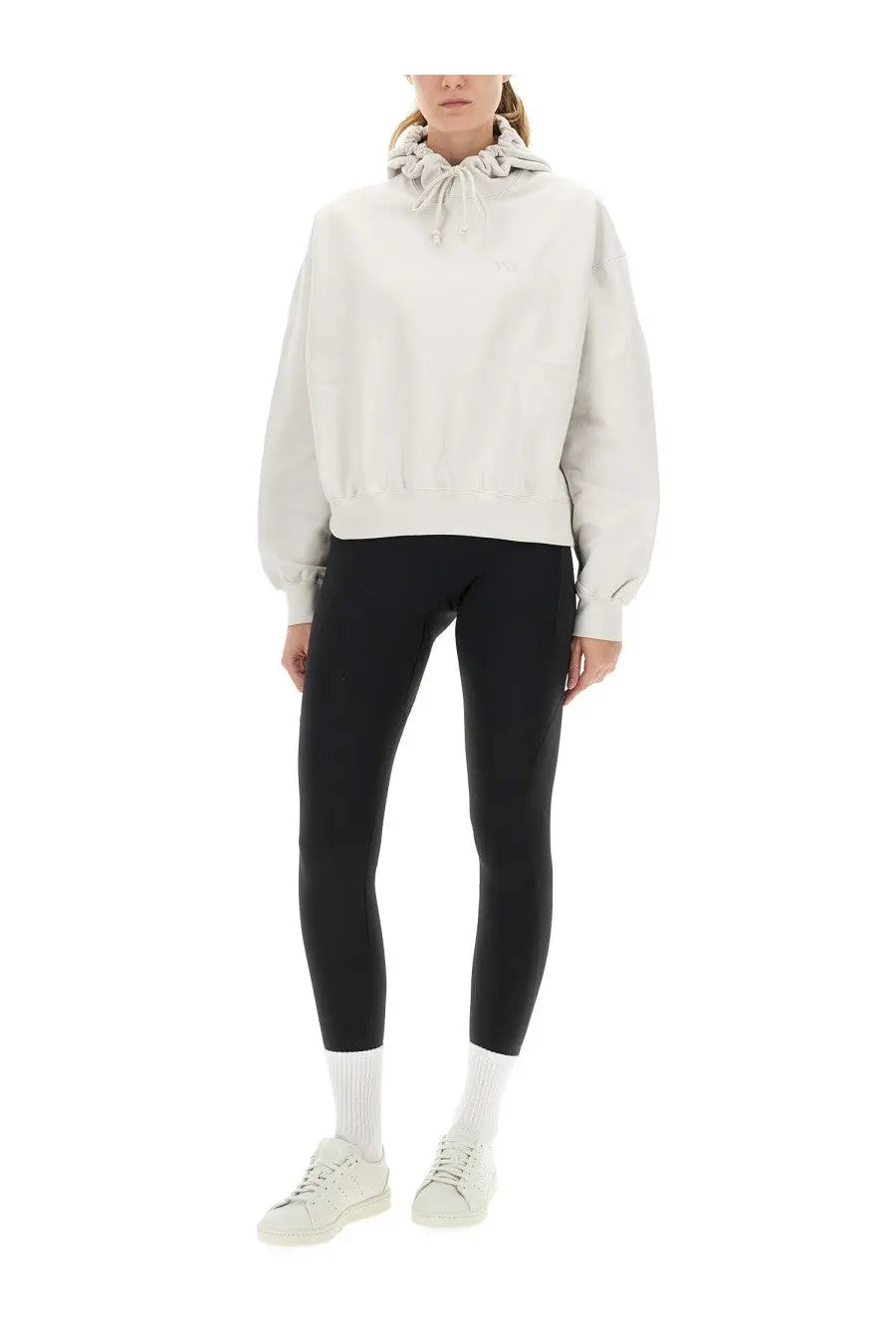 Off-white y-3 women’s oversized hoodie with drawstring hood and subtle chest logo in soft material