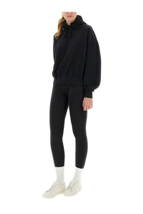 Y-3 women’s black oversized hoodie with drawstring hood and long sleeves made from soft cotton blend