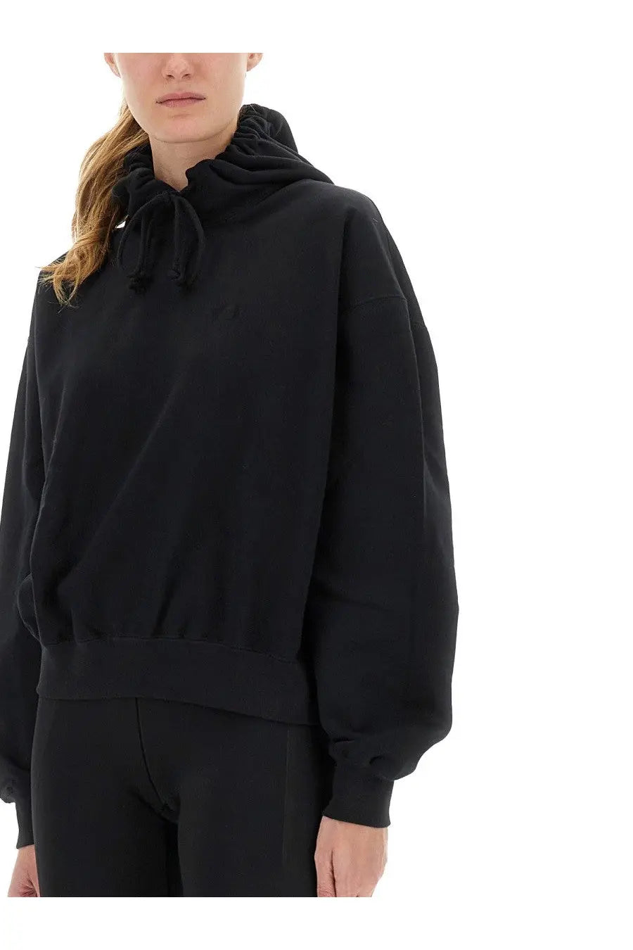 Black oversized y-3 women’s hoodie with drawstring hood and ribbed cuffs in soft fabric for casual wear