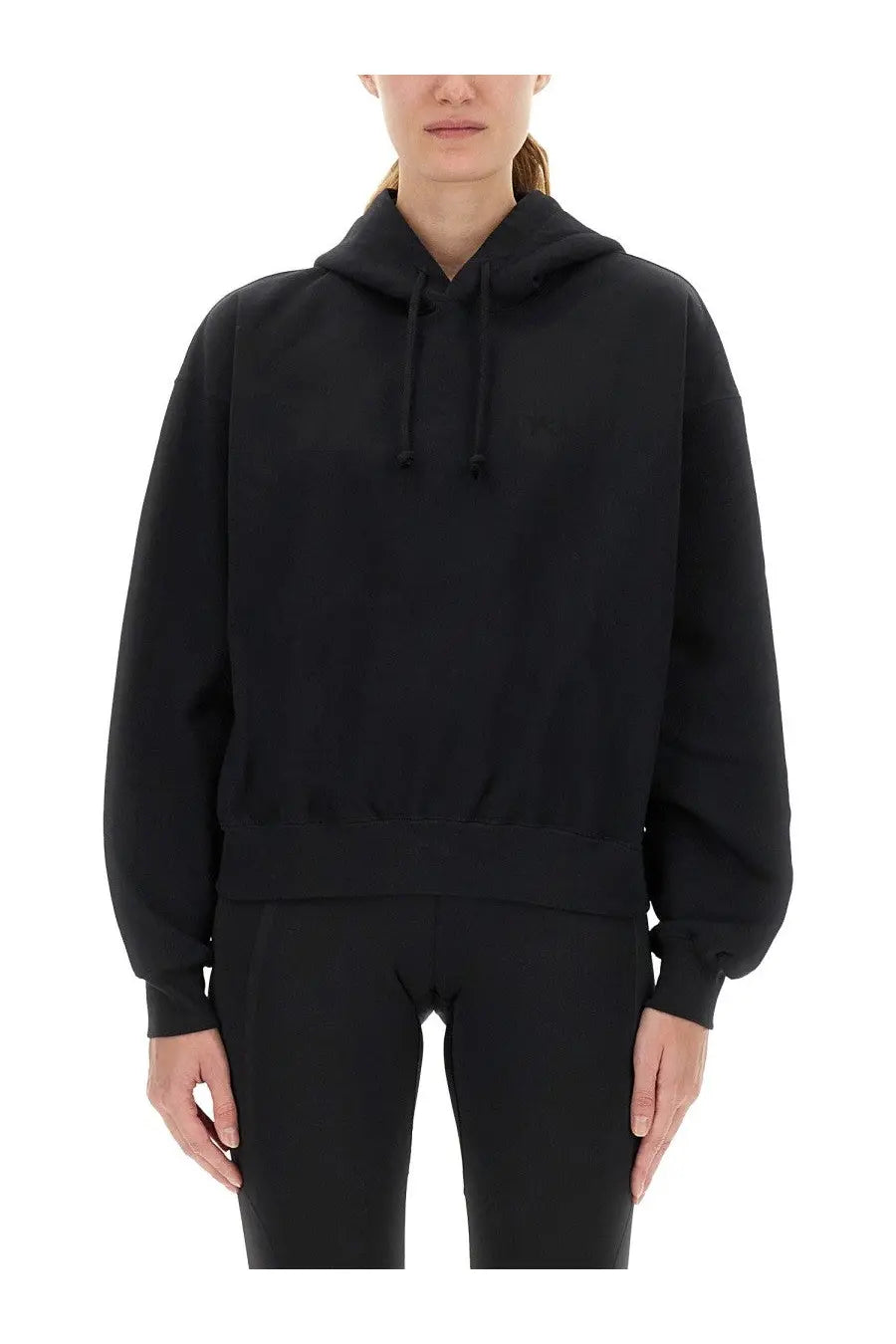 Y-3 women’s black oversized hoodie with relaxed fit and ribbed cuffs made from soft fabric