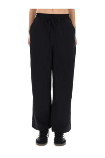 Y-3 women’s black wide-leg jogging pants with drawstring waistband and side pockets for comfortable casual wear
