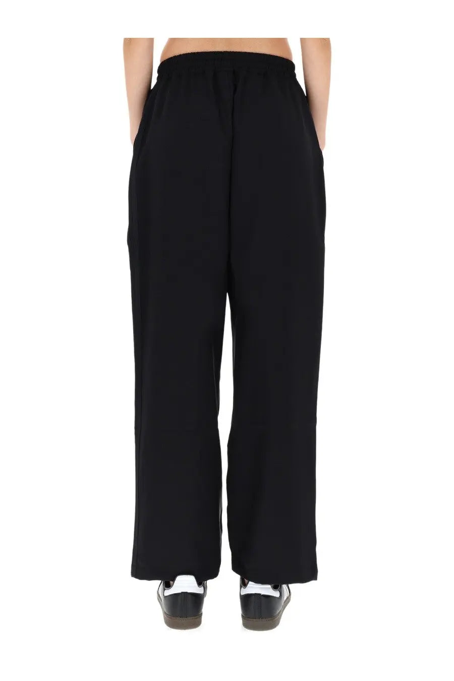 Black y-3 women’s jogging pants with elastic waistband side pockets and wide-leg design for comfortable wear