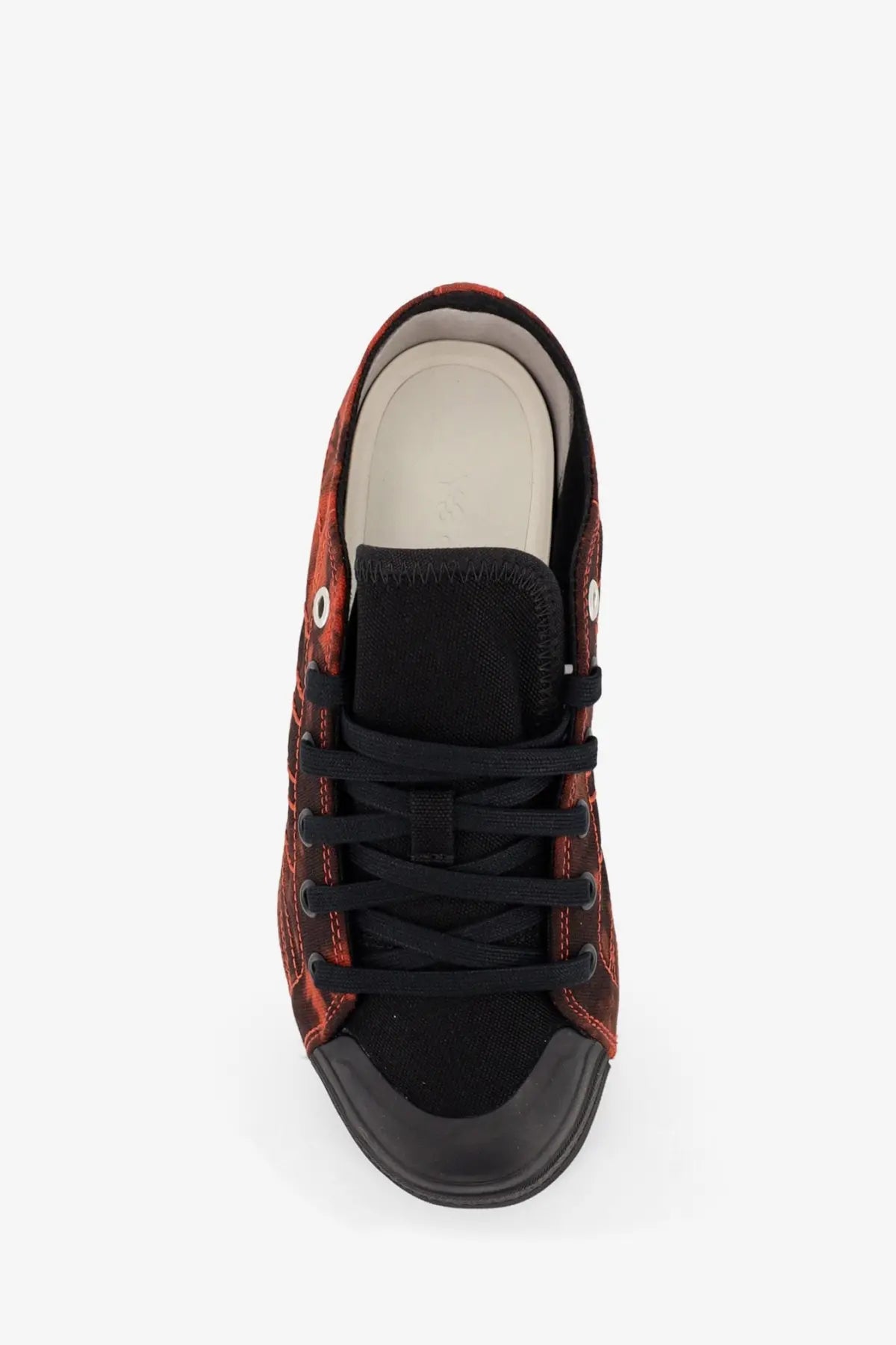 Y-3 women’s Nizza Lo canvas sneakers in black with red and black pattern high-top design and rubber toe cap