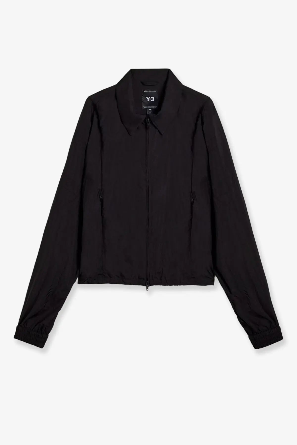 Black y-3 women’s nylon zip-up jacket with sleek minimalist design and subtle branding at the collar