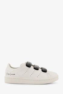 Y-3 women’s stan smith grey leather sneaker with white base black velcro straps and signature logo on the side