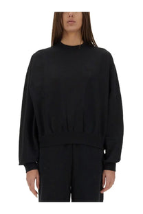 Black oversized Y-3 women’s crewneck sweatshirt with ribbed hem and cuffs made from soft fabric for casual wear