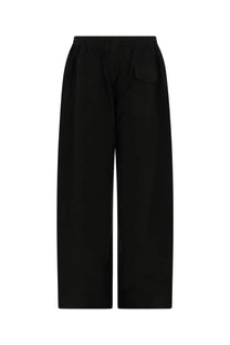 Black wide-leg trousers with elastic waistband and single front pocket from ymc men’s pants envelope green collection