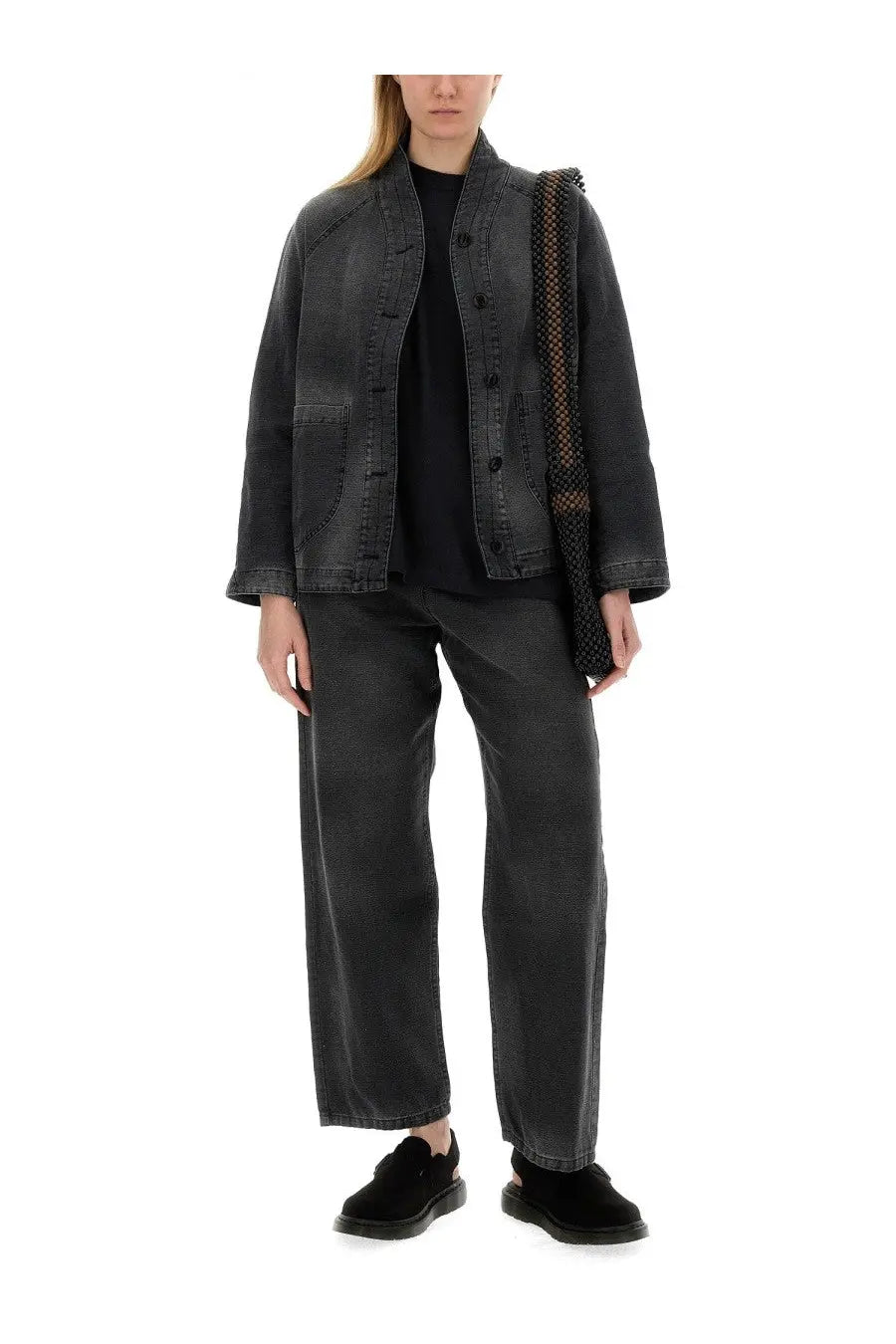 Black denim jacket with a relaxed fit and button closures from YMC women’s jeans silver black collection