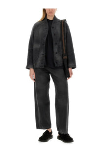 Black denim jacket with a relaxed fit and button closures from YMC women’s jeans silver black collection