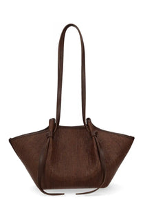 Brown woven tote bag with leather handles and tied side straps yuzefi women borsa mochi in raffia brown