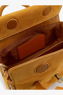 Zanellato women’s Dotta Baby suede crossbody bag in tan with circular leather accents and metallic hardware