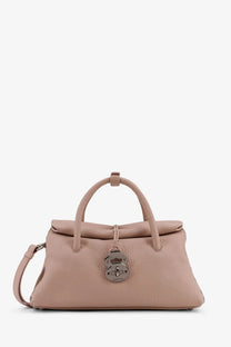 Zanellato women’s hammered leather dotta small crossbody bag in soft blush pink with metallic lock closure and rolled handles