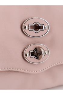 Pink leather zanellato women’s postina baby crossbody bag with silver oval clasps and textured metal lock mechanism