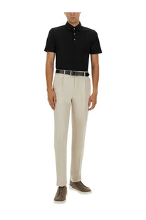 A sleek black short-sleeved cotton polo shirt by Zegna with a classic collar and buttoned placket for men
