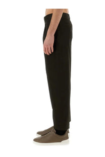 Zegna men’s black tailored trousers with a sleek straight-leg cut and subtle pleats at the waistband